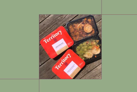 Best Keto Meal Delivery Territory Foods boxes on table background Best Keto Meal Delivery Territory Foods boxes on table background