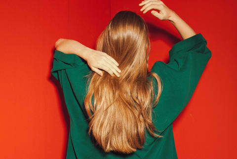 Young Blond Woman Playing With Her Hair Young Blond Woman Playing With Her Hair